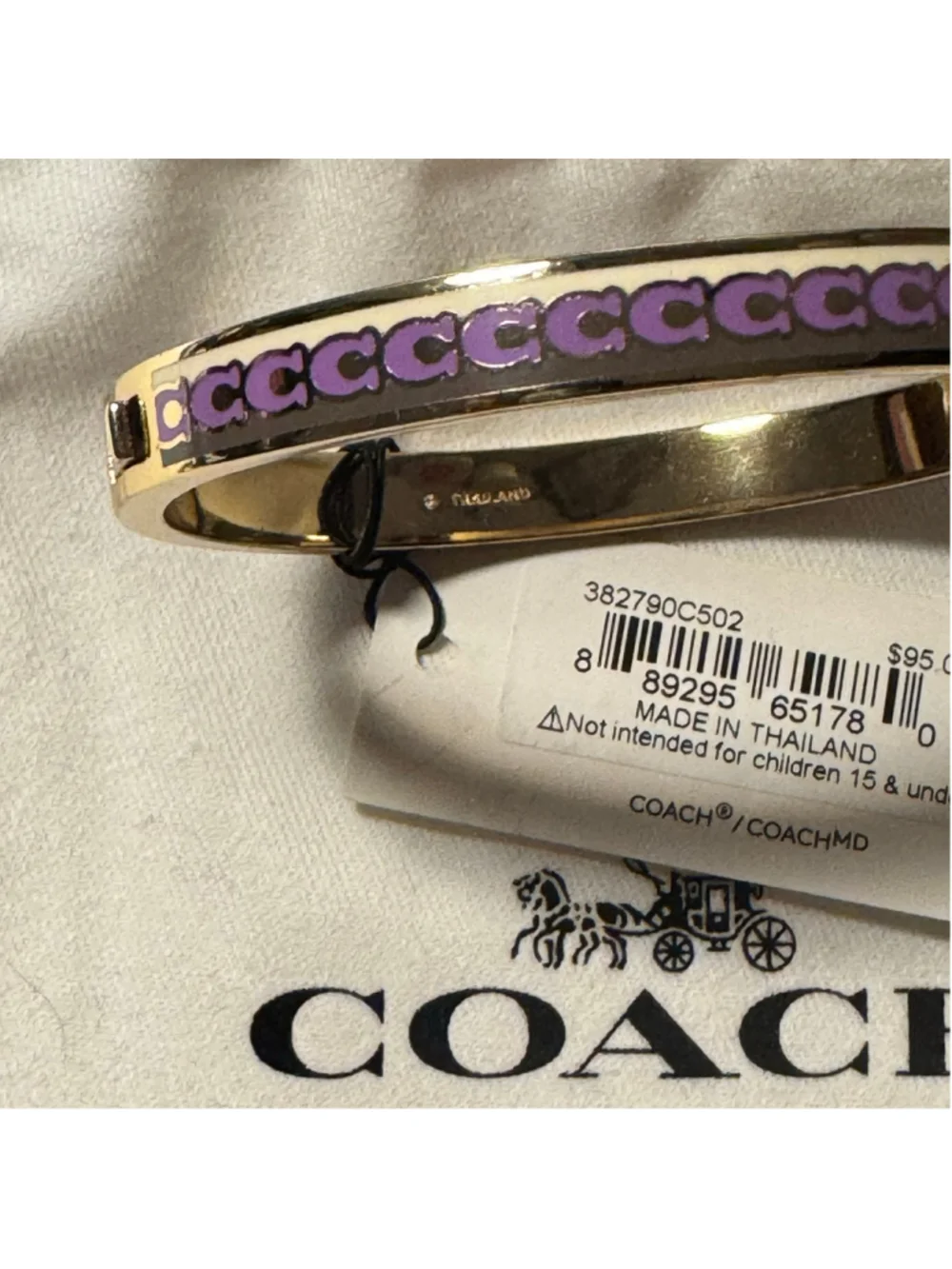 Coach repeating, C logo, gold, and purple hinged enamel bracelet